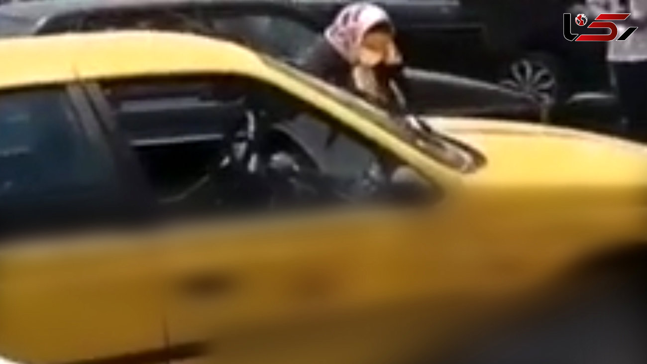 فیلم قمه کشی زن ابهری به یک تاکسی