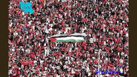 اهتزاز پرچم فلسطین در جشن قهرمانی تراکتور
