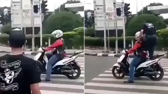 درسی جالب که عابر پیاده به موتور سوار متخلف داد! + فیلم
