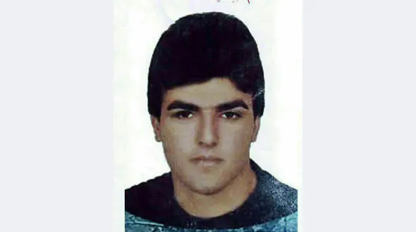  این قاتل را می شناسید؟/پلیس کرمانشاه در تعقیب این فراری است+عکس