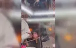 فیلم سرقت سرقت برق‌آسای گوشی از کیف یک زن توسط نوجوان تهرانی