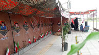 برپایی نمایشگاه عکس شهدا در ورودی شهر آبدان