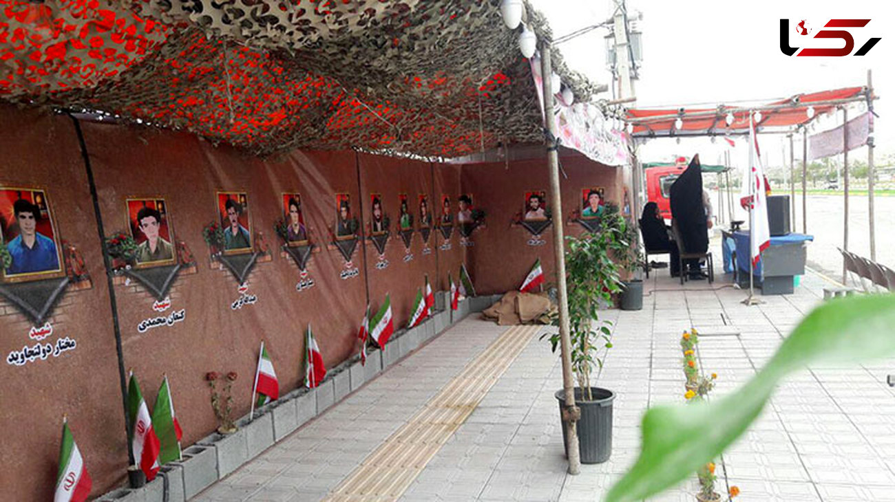 برپایی نمایشگاه عکس شهدا در ورودی شهر آبدان