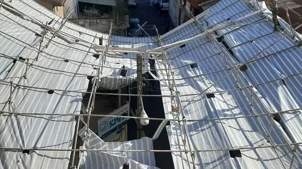 سقوط داربست ساختمان 6 طبقه حادثه ساز شد/به همراه عکس