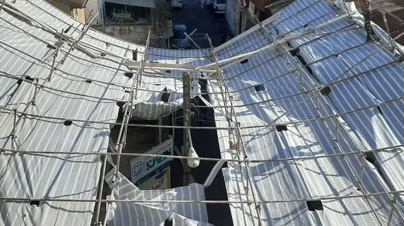 سقوط داربست ساختمان 6 طبقه حادثه ساز شد/به همراه عکس