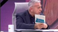 رونمایی از قرص اورانیوم هسته‌ای در برنامه زنده تلویزیونی + فیلم