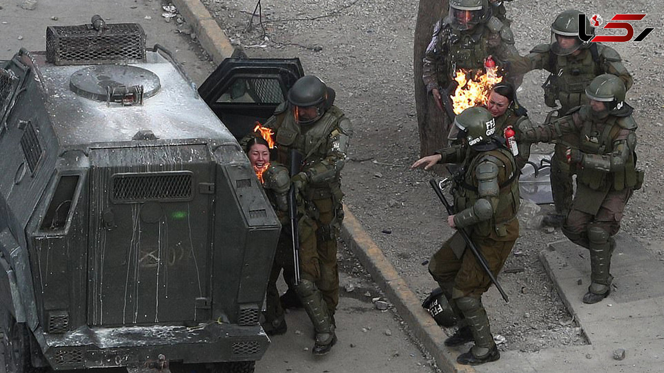 لحظه آتش گرفتن 2 خانم پلیس + عکس وحشتناک / شیلی