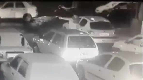 فیلم صحنه تیراندازی دزد و پلیس بهم در ولنجک / مامور زخمی شد