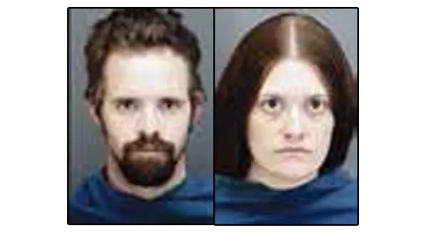 دستگیری پدر و نامادری کودک آزار+عکس