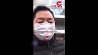 سیگار کشیدن یک مرد با ماسک ! + فیلم