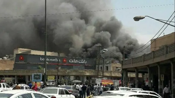 مهار آتش سوزی پاساژ رضوان اهواز / 8 آتش نشان مجروح شدند 
