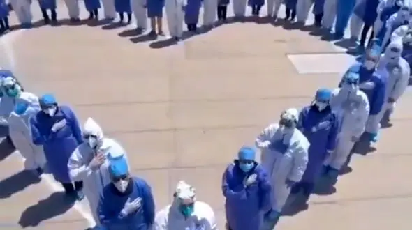 اجرای زیبای سرود ملی ایران توسط مدافعان سلامت + فیلم 