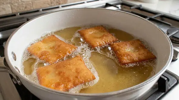 طرز تهیه گوش فیل خانگی ترد و پفکی با شربت زعفران
