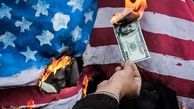 آتش زدن ۱۰۰ دلاری در راهپیمایی امروز؟! +عکس

