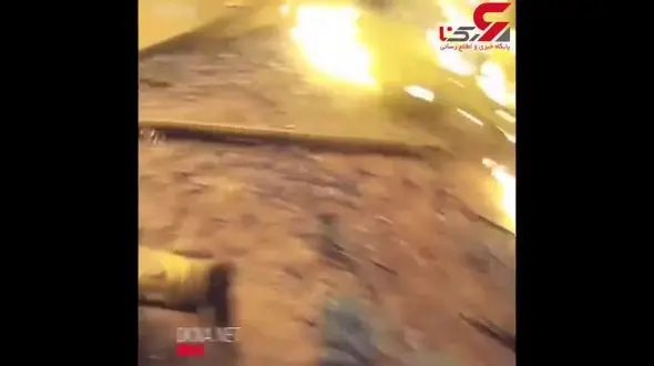 لحظه نفس گیر نجات یک کودک از ساختمانی درحال سوختن +فیلم