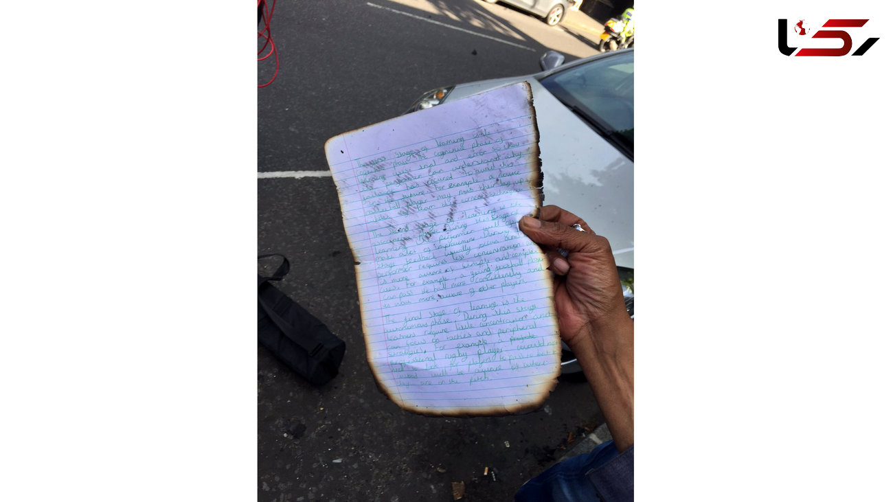 یک دست نوشته از داخل برج آتشین لندن بیرون پرت شد/ما 100 نفر در حال مردن هستیم + عکس دستنوشته