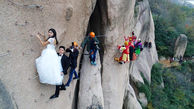  عروس و داماد ماجراجو روی صخره های وحشت + تصاویر دلهره اور