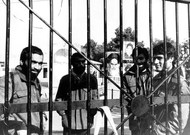 محسن وزوایی، دانشجوی شیمی دانشگاه شریف، نخستین کسی بود که از دیوار بالا رفت و وارد سفارت شد. او در سال ۱۳۶۱ و هنگام شهادت، فرمانده تیپ ۱۰ سیدالشهدای تهران بود - دانشجویان پیرو خط امام در جریان اشغال سفارت آمریکا در 13 آبان 1358