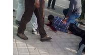 شلیک به سر مقابل بیمارستان کنگان / بازداشت مرد مسلح توسط مردم + عکس