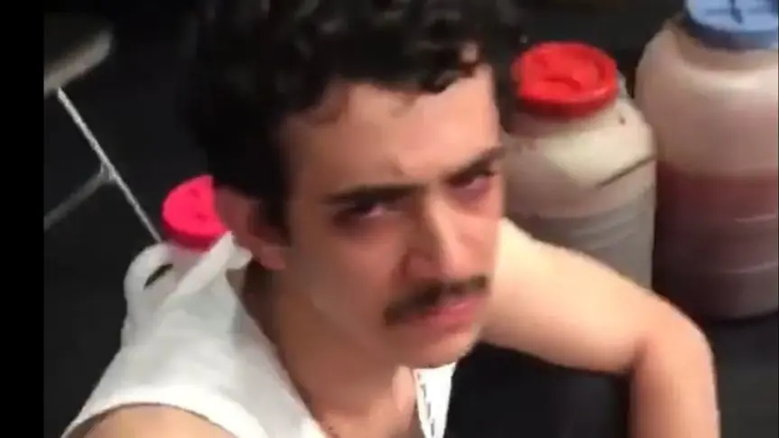 فیلم دستگیری علی شادمان در زهرماری / چشمای قرمز و حدقه بیرون زده ی او را ببینید!