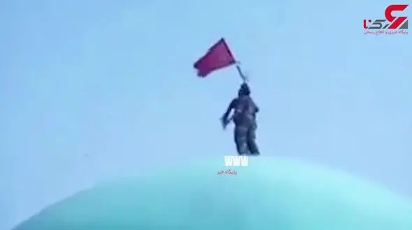 شهید بیضایی و اهتراز پرچم در نزدیکی تکفیری ها+فیلم
