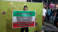 پلاکارد یک خانم پرستار ایرانی در قطر غوغا کرد + عکس