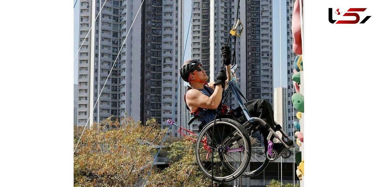 بالارفتن یک معلول با ویلچر از  آسمان‌خراش + عکس