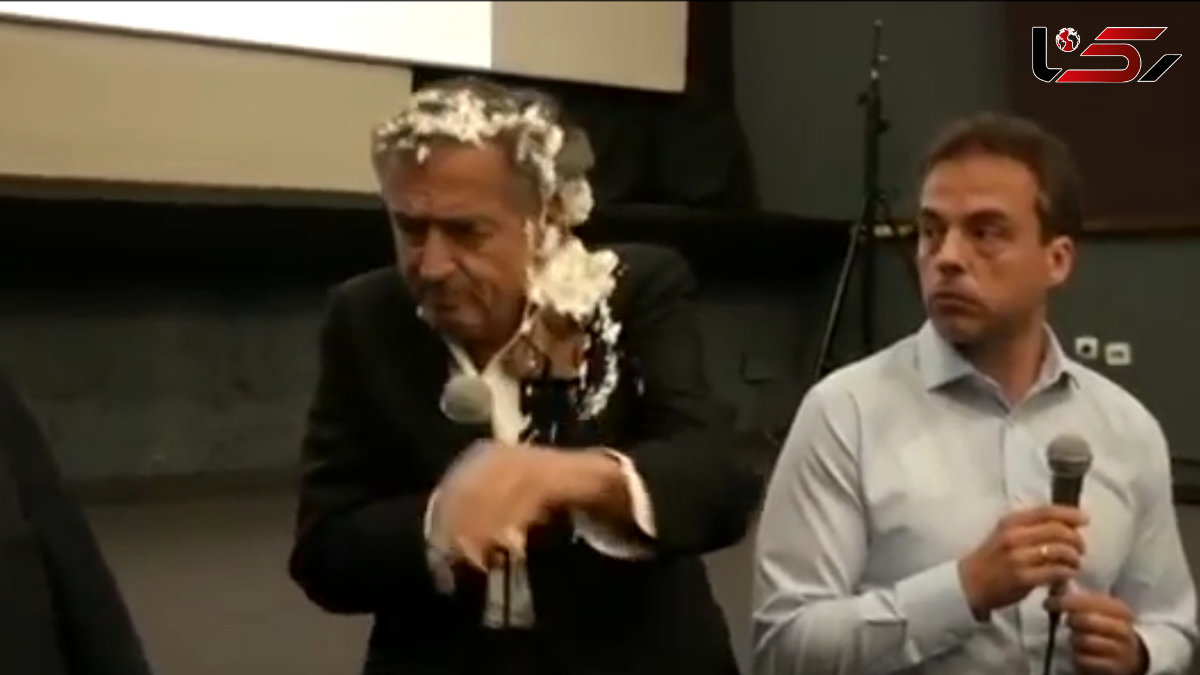 پرتاب کیک به صورت کارگردان فیلم "پیشمرگه" + فیلم و عکس