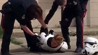 حمله پلیس به دختر جوان با لباسی عجیب / کانادا + فیلم و عکس