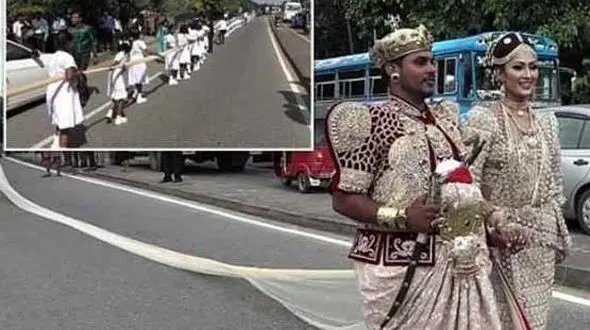 حمل پر دردسر دنباله لباس عروس توسط دانش آموزان سریلانکایی