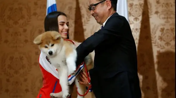قهرمان المپیک ژاپنی یک توله سگ از مقامات کشورش هدیه گرفت+تصاویر