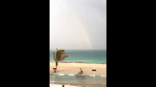 اولین باران پاییزی و رنگین کمان امسال در جزیره کیش + فیلم