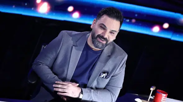اولین عکس از احسان علیخانی در خوی /  او با دختر زیبا در برف سلفی گرفت!