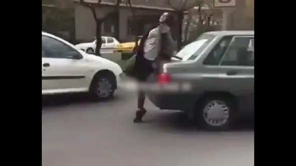حمله دختر بی ام و سوار به کانکس پلیس در بلوار اندرزگوی تهران + فیلم