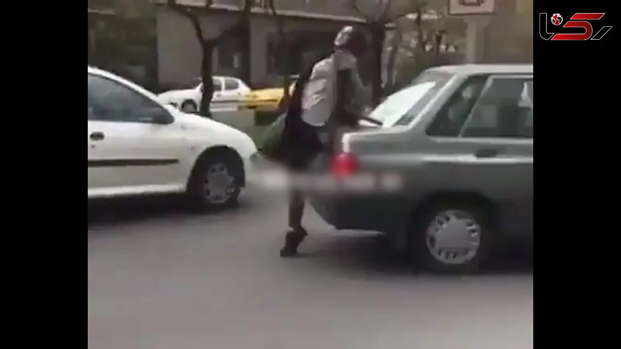 حمله دختر بی ام و سوار به کانکس پلیس در بلوار اندرزگوی تهران + فیلم