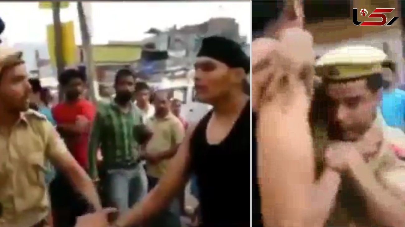 شرور قد بلند دو مامور پلیس را کتک زد و گریخت + فیلم