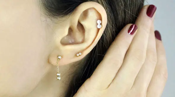 پیرسینگ گوش دخترانه طلا طرح مینیمال / عکس
