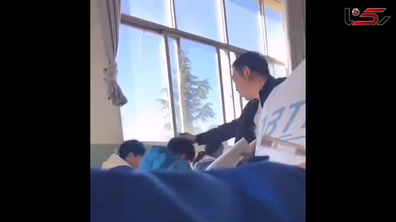 فیلم تلخ از تنبیه وحشیانه یک دانش‌آموز چینی توسط معلم 