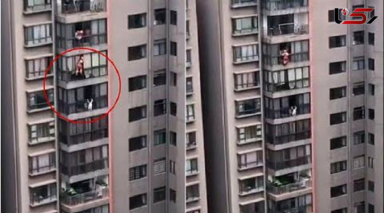 لحظه نفسگیر آویزان شدن یک دختر 5 ساله از پنجره طبقه ۱۳ برج! + فیلم