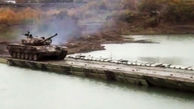 فیلم گستاخی علی اف و اردوغان با رزمایش در رودخانه ارس ! / ایجاد پل جنگی روی ارس و عبور تانک ها !