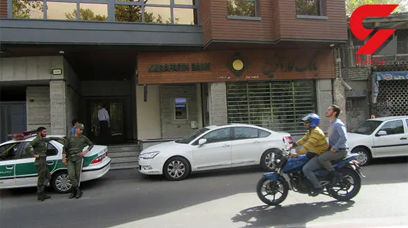 سرقت مسلحانه دزد نقابدار از یک بانک در دزاشیب + فیلم و عکس