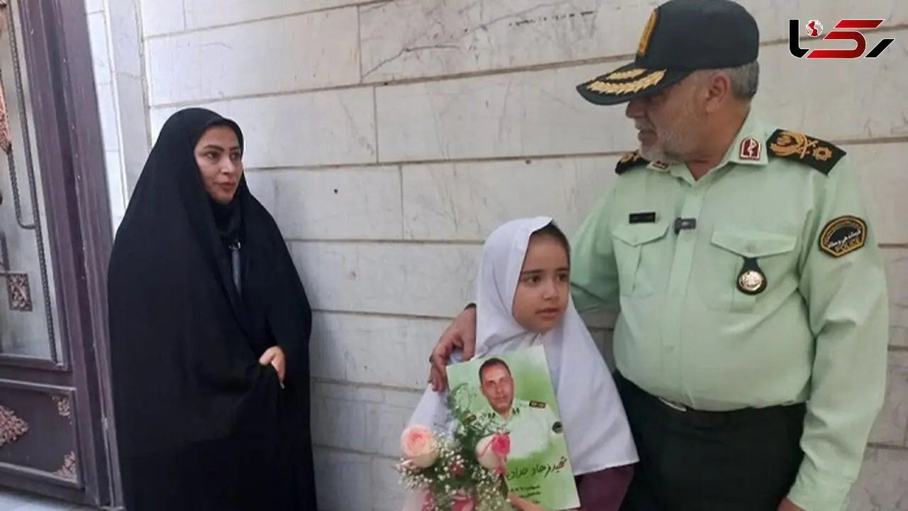 همراهی رئیس پلیس آگاهی فراجا با فرزند شهید حدادیان پور در اولین روز مدرسه