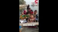 فیلمی جالب از قایقی که کلاس درس کودکان سیل زده است+ عکس
