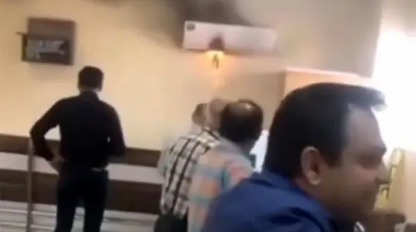 ببینید | تصاویر واکنش عجیب شیرازی‌ها به آتش گرفتن کولرگازی در ثبت احوال
