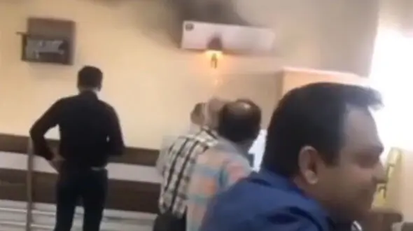 ببینید | تصاویر واکنش عجیب شیرازی‌ها به آتش گرفتن کولرگازی در ثبت احوال
