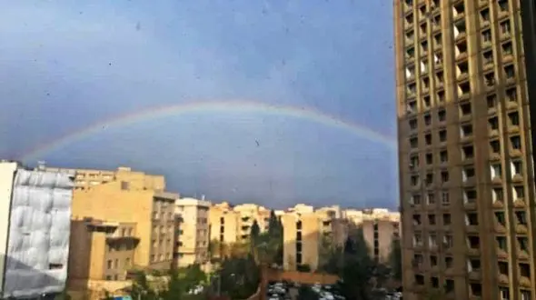عکس رنگین کمان بزرگ در آسمان تهران / در نخستین روز سال 1402