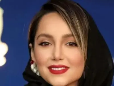 عکس ها / نگاهی به چیدمان رویایی خانه نازنین بیاتی / فرش 9 متری اصیل ایرانی روی دیوار و اتاق خواب و تابلوهای رنگی رنگی دلچسب