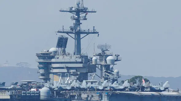 US aircraft carrier downs Iranian drone as tensions rise and diplomatic talks falter