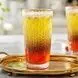 طرز تهیه شربت خاکشیر دو رنگ خوش‌ رنگ و خنک برای روزهای گرم + ایده های خلاقانه و متنوع