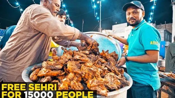 فیلم/ نحوه پخت 15 هزار پرس چلو مرغ توسط آشپزهای پاکستانی برای سحری ماه رمضان 